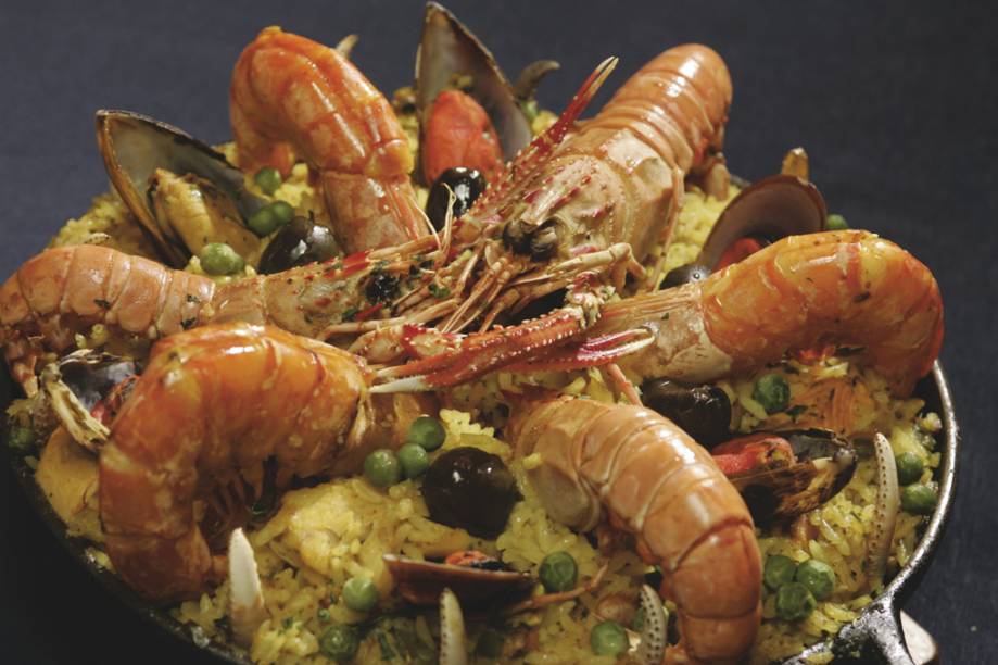 Paella do restaurante <strong><a href="https://viajeaqui.abril.com.br/estabelecimentos/br-go-goiania-restaurante-companhia-do-peixe" rel="Companhia do Peixe" target="_blank">Companhia do Peixe</a></strong>