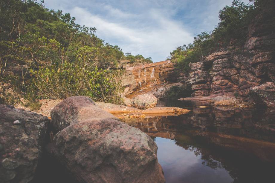 <strong>12. Cachoeira do Riachinho (Vale do Capão)</strong>Uma queda de 8 metros desemboca em piscinas naturais depois de uma caminhada curtinha e fácil. <a href="https://www.booking.com/searchresults.pt-br.html?aid=332455&sid=8118a1a04f2fb6081078124dc7c2384f&sb=1&src=searchresults&src_elem=sb&error_url=https%3A%2F%2Fwww.booking.com%2Fsearchresults.pt-br.html%3Faid%3D332455%3Bsid%3D8118a1a04f2fb6081078124dc7c2384f%3Bclass_interval%3D1%3Bdest_id%3D-646477%3Bdest_type%3Dcity%3Bdtdisc%3D0%3Bfrom_sf%3D1%3Bgroup_adults%3D2%3Bgroup_children%3D0%3Binac%3D0%3Bindex_postcard%3D0%3Blabel_click%3Dundef%3Bno_rooms%3D1%3Boffset%3D0%3Bpostcard%3D0%3Braw_dest_type%3Dcity%3Broom1%3DA%252CA%3Bsb_price_type%3Dtotal%3Bsearch_selected%3D1%3Bsrc%3Dindex%3Bsrc_elem%3Dsb%3Bss%3DIgatu%252C%2520%25E2%2580%258BBahia%252C%2520%25E2%2580%258BBrasil%3Bss_all%3D0%3Bss_raw%3DIgatu%3Bssb%3Dempty%3Bsshis%3D0%26%3B&ss=Vale+do+Cap%C3%A3o%2C+Bahia%2C+Brasil&is_ski_area=&ssne=Igatu&ssne_untouched=Igatu&city=-646477&checkin_monthday=&checkin_month=&checkin_year=&checkout_monthday=&checkout_month=&checkout_year=&no_rooms=1&group_adults=2&group_children=0&b_h4u_keep_filters=&from_sf=1&ss_raw=Vale+do+&ac_position=0&ac_langcode=xb&dest_id=900050209&dest_type=city&place_id_lat=-12.60937&place_id_lon=-41.500233&search_pageview_id=8e738a17fe1c0014&search_selected=true&search_pageview_id=8e738a17fe1c0014&ac_suggestion_list_length=5&ac_suggestion_theme_list_length=0" target="_blank" rel="noopener"><em>Busque hospedagens no Vale do Capão</em></a>