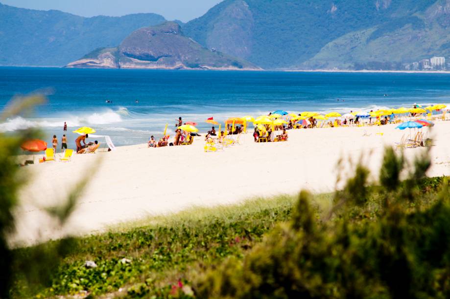 <a href="https://viajeaqui.abril.com.br/estabelecimentos/br-rj-rio-de-janeiro-atracao-praia-da-reserva" rel="Praia da Reserva " target="_blank"><strong>Praia da Reserva </strong></a>Tem esse nome pela sua proximidade com a Área de Proteção Ambiental de Marapendi, que empresta um pouco do seu verde ao visual. A extensão avantajada faz com que a praia nunca fique lotada