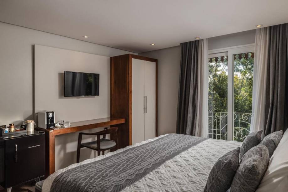 Todos os quartos possuem frigobar e cafeteira, com cortesias Todos os quartos possuem frigobar e cafeteira, com cortesias