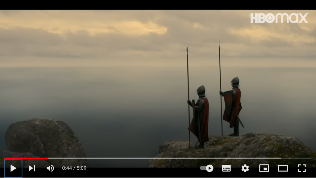 Captura de ecrã 2022-10-25, às 19.13.57 Reprodução de um trecho da série A Casa do Dragão que mostra dois personagens no topo da montanha com uma bela vista do vale